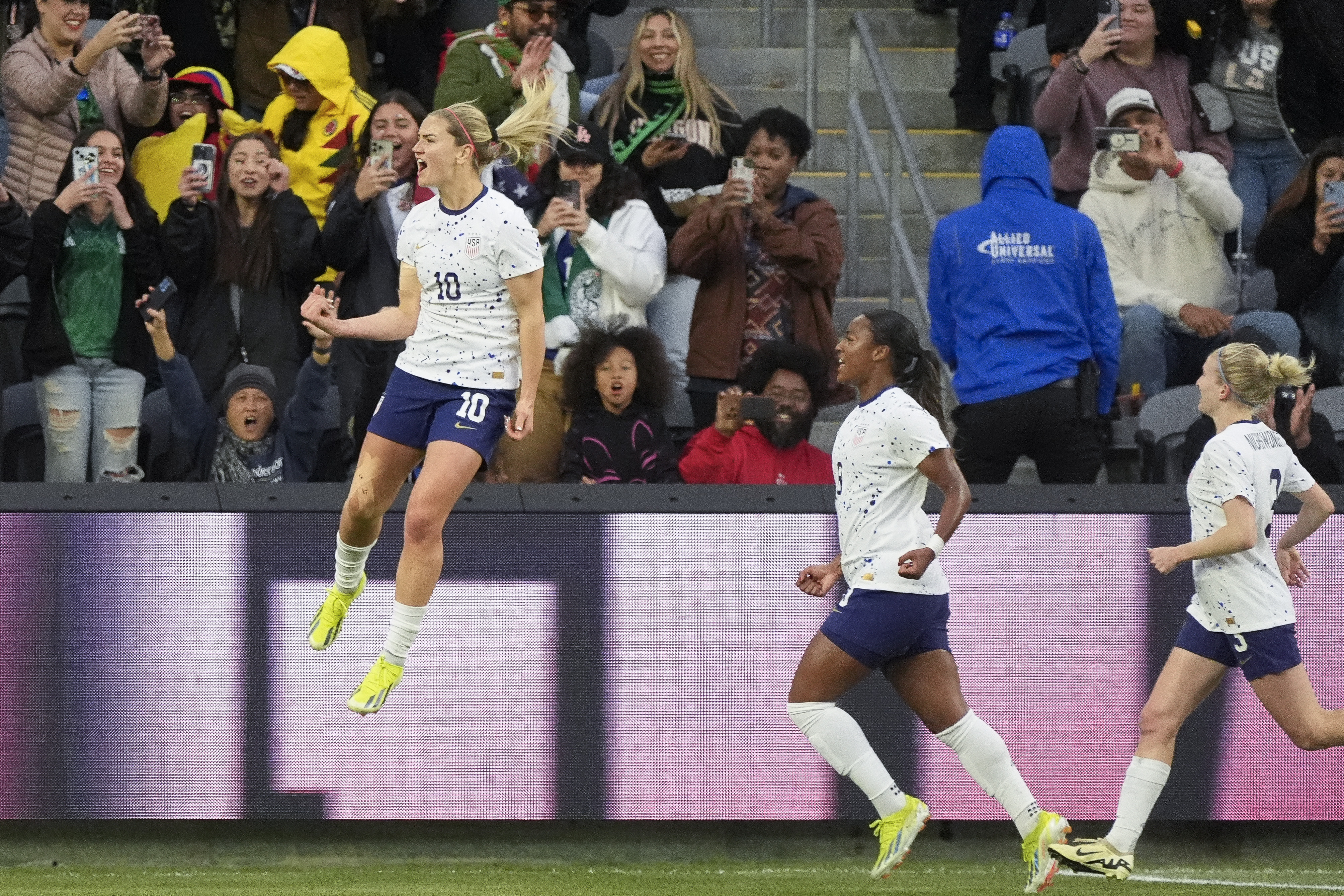 United States midfielder Lindsey Horan (10) celebrates after scoring on a penalty kick during the first half of a CONCACAF Gold Cup women's soccer tournament quarterfinal against Colombia, Sunday, March 3, 2024, in Los Angeles. 