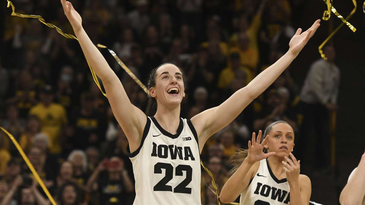 Iowa guard Caitlin Clark (22) celebrates during Senior Day ceremonies following a victory over Ohio State in an NCAA college basketball game, Sunday, March 3, 2024, in Iowa City, Iowa.