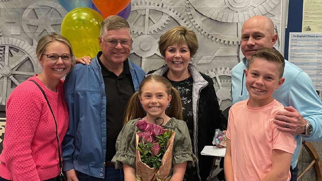 Kerri Robbins (back row middle) with members of her family.