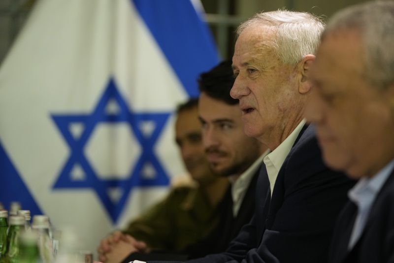 Former Israeli Defense Minister Benny Gantz, second right, meets with U.S. Secretary of State Antony Blinken in Tel Aviv, Israel, Feb. 8.