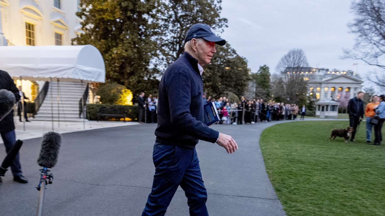 President Joe Biden walks toward Marine One at the White House in Washington, March 1. The White House has lifted its COVID-19 testing requirement for those who plan to be in close contact with the president.