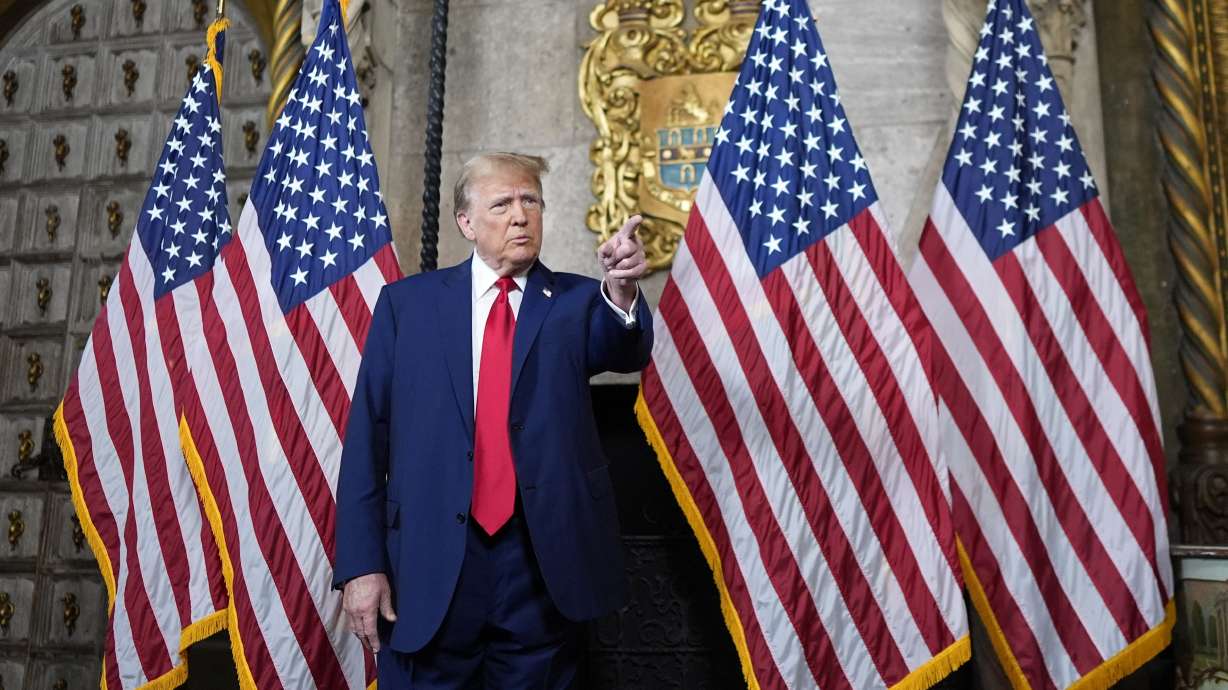 Republican presidential candidate former President Donald Trump points to a reporter for a question as he speaks at his Mar-a-Lago estate, Monday, in Palm Beach, Fla.