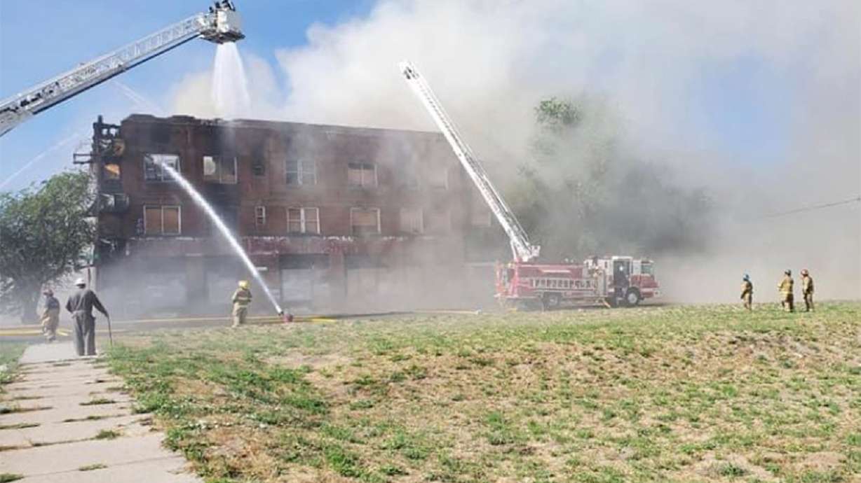 Fire crews put out a fire at the Broadway Hotel in Tooele on July 5, 2020. Nearly four years after the fire, a man has been indicted on three Clean Air Act Violation charges.