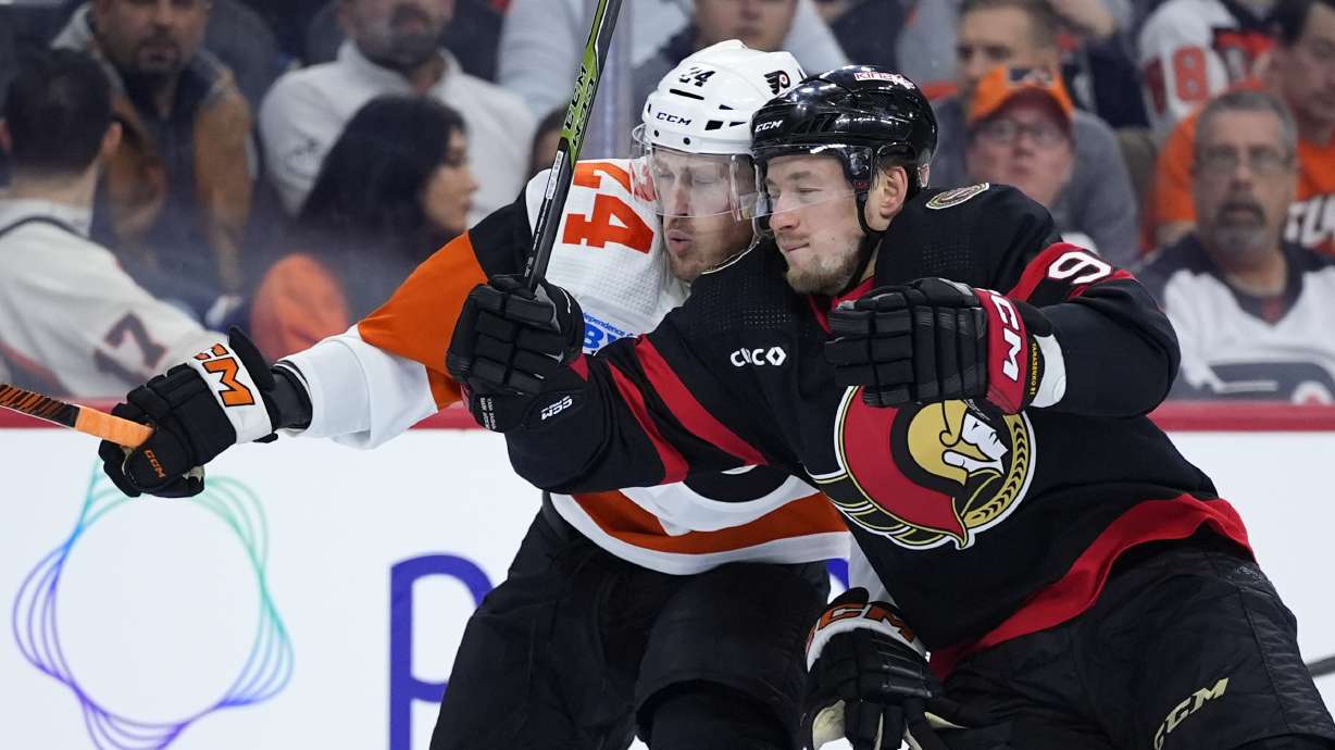 Philadelphia Flyers' Nick Seeler, left, and Ottawa Senators' Vladimir Tarasenko collide during the first period of an NHL hockey game, Saturday, March 2, 2024, in Philadelphia.