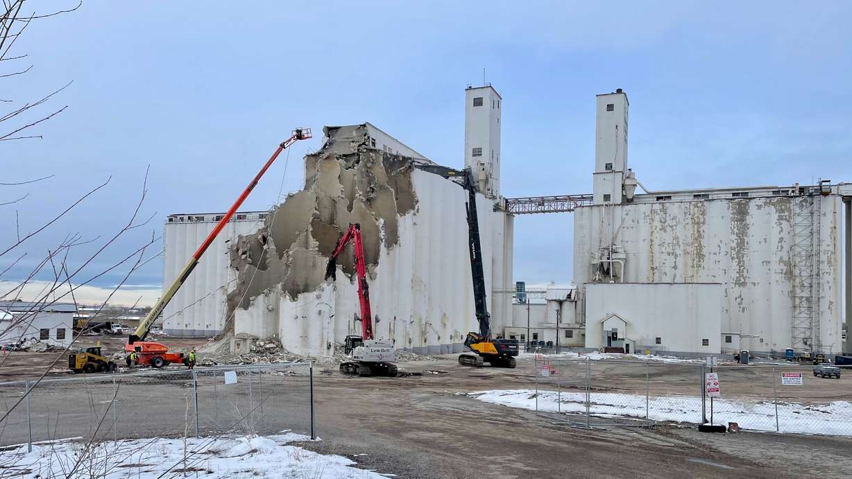The old Farmers Grain Cooperative grain elevator in west Ogden, photographed March 5, is now demolished. Built in 1941, its demise underscores the changing local economy and shift from agriculture.
