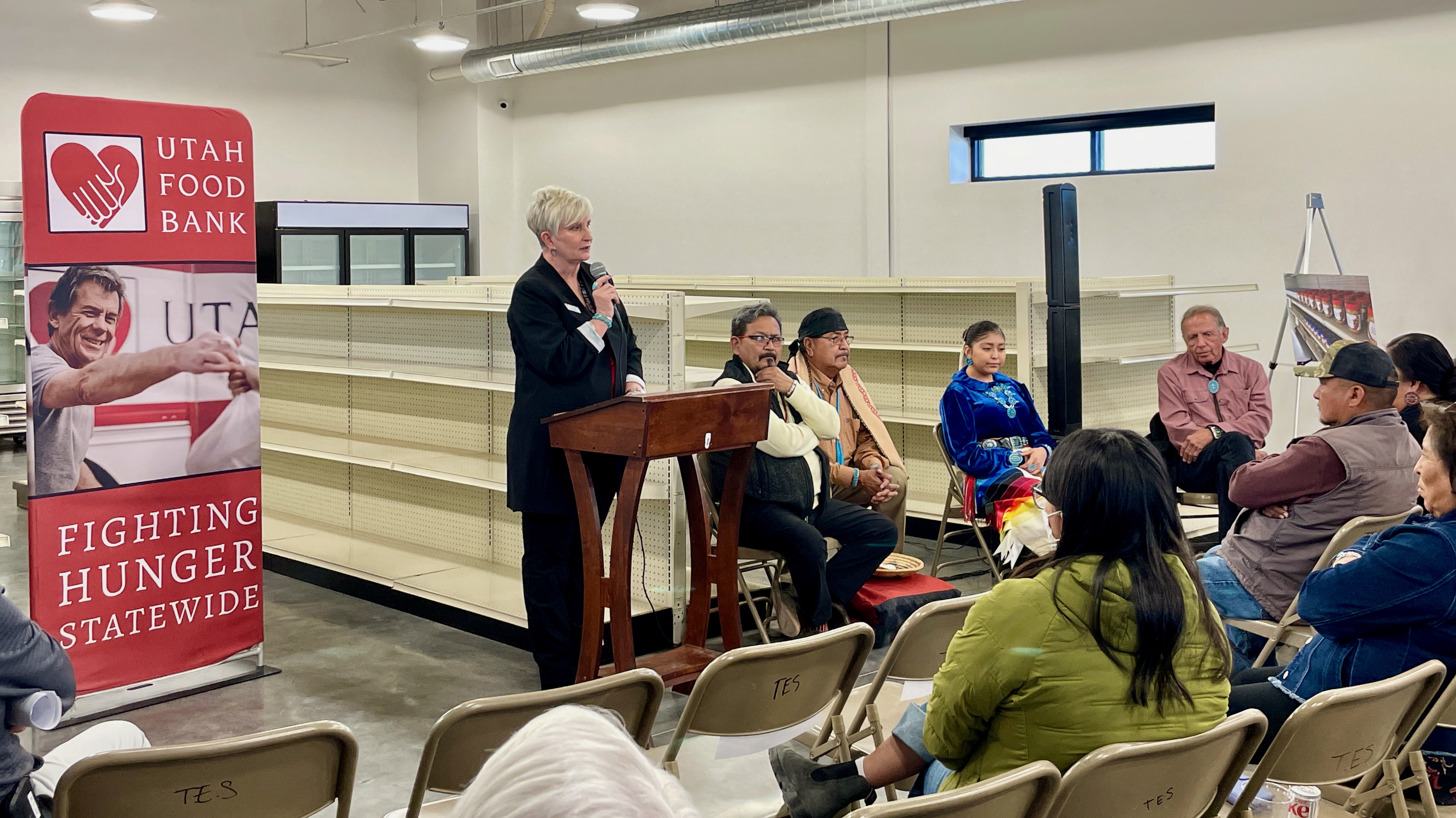 Ginette Bott, the Utah Food Bank president and chief executive officer, addresses a gathering at the inauguration on Wednesday of a new food pantry in Monument Valley that's meant to serve the Navajo Nation.