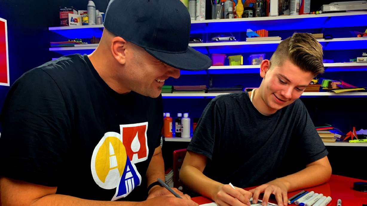 Rob Jensen teaches his son to draw on his YouTube channel, Art For Kids Hub.