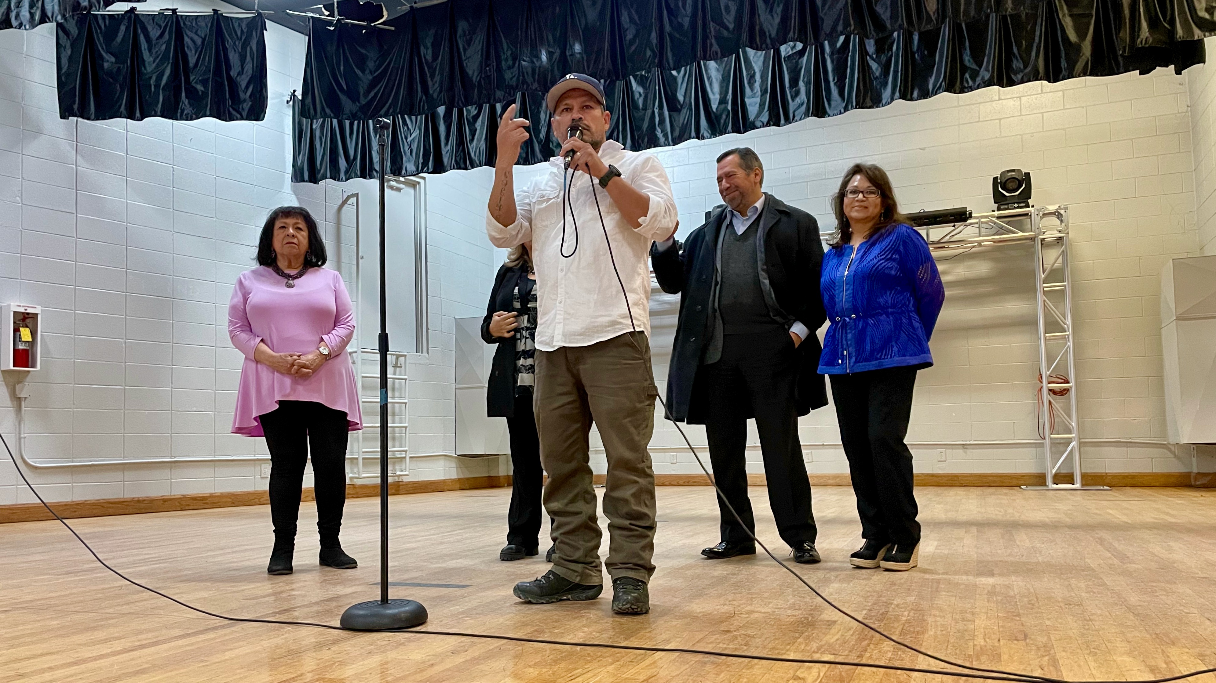 Luis Valentan, an organizer with the National Day Laborer Organizing Network, addresses a gathering Wednesday, at the Mexican Civic Center in Salt Lake City in support of day laborers. Also on the stage, from left, are Brandy Farmer, the civic center director; Belia Paz; Eduardo Baca, general consul at the Mexican Consulate in Salt Lake City; and Irma Hofer.