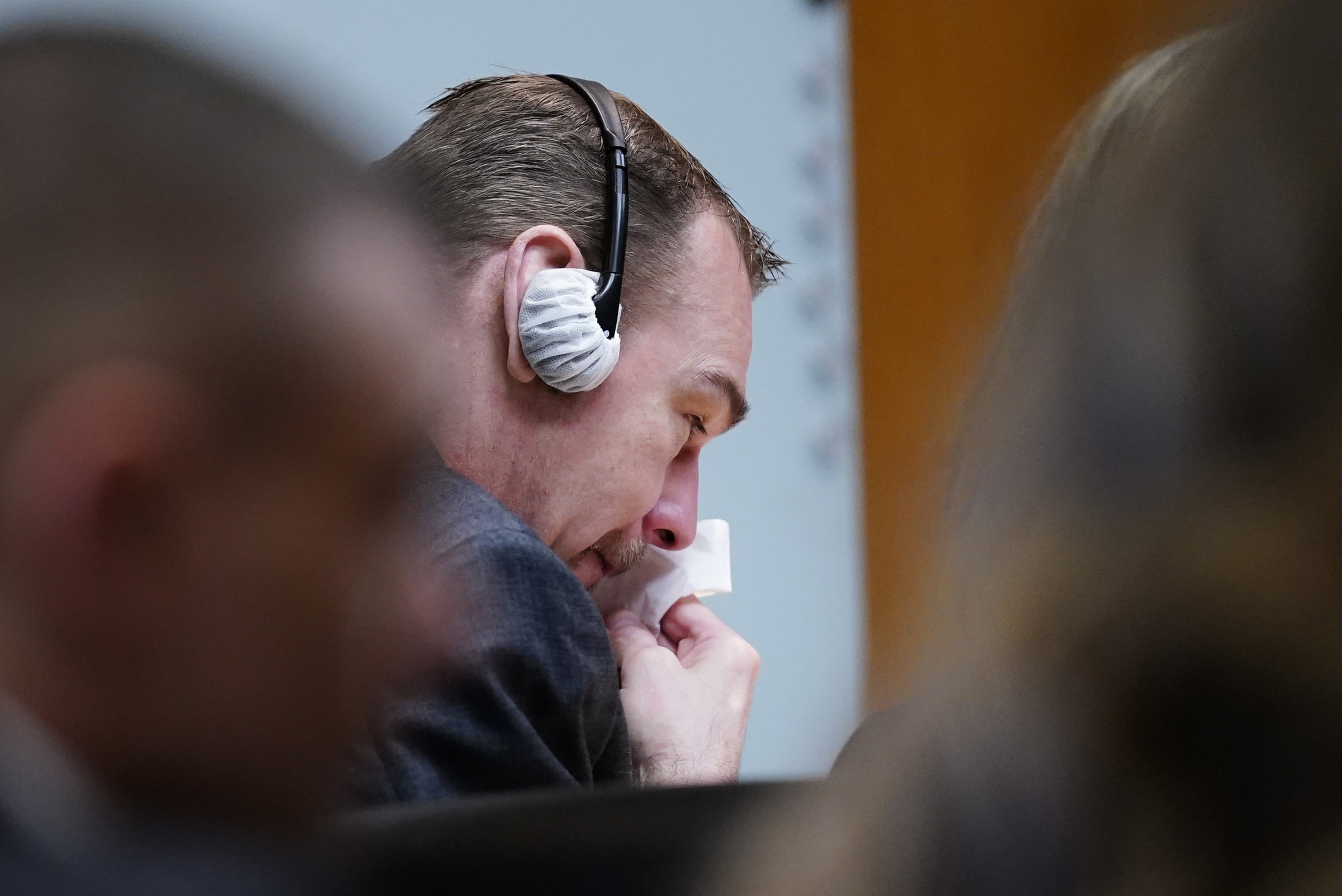 James Crumbley becomes emotional during the testimony of Oxford High School educator Molly Darnell as he sits with his attorney Mariell Lehman on Thursday, in Pontiac, Mich. James Crumbley, 47, is charged with four counts of involuntary manslaughter, one for each teenager killed by Ethan Crumbley at Oxford High School in 2021.