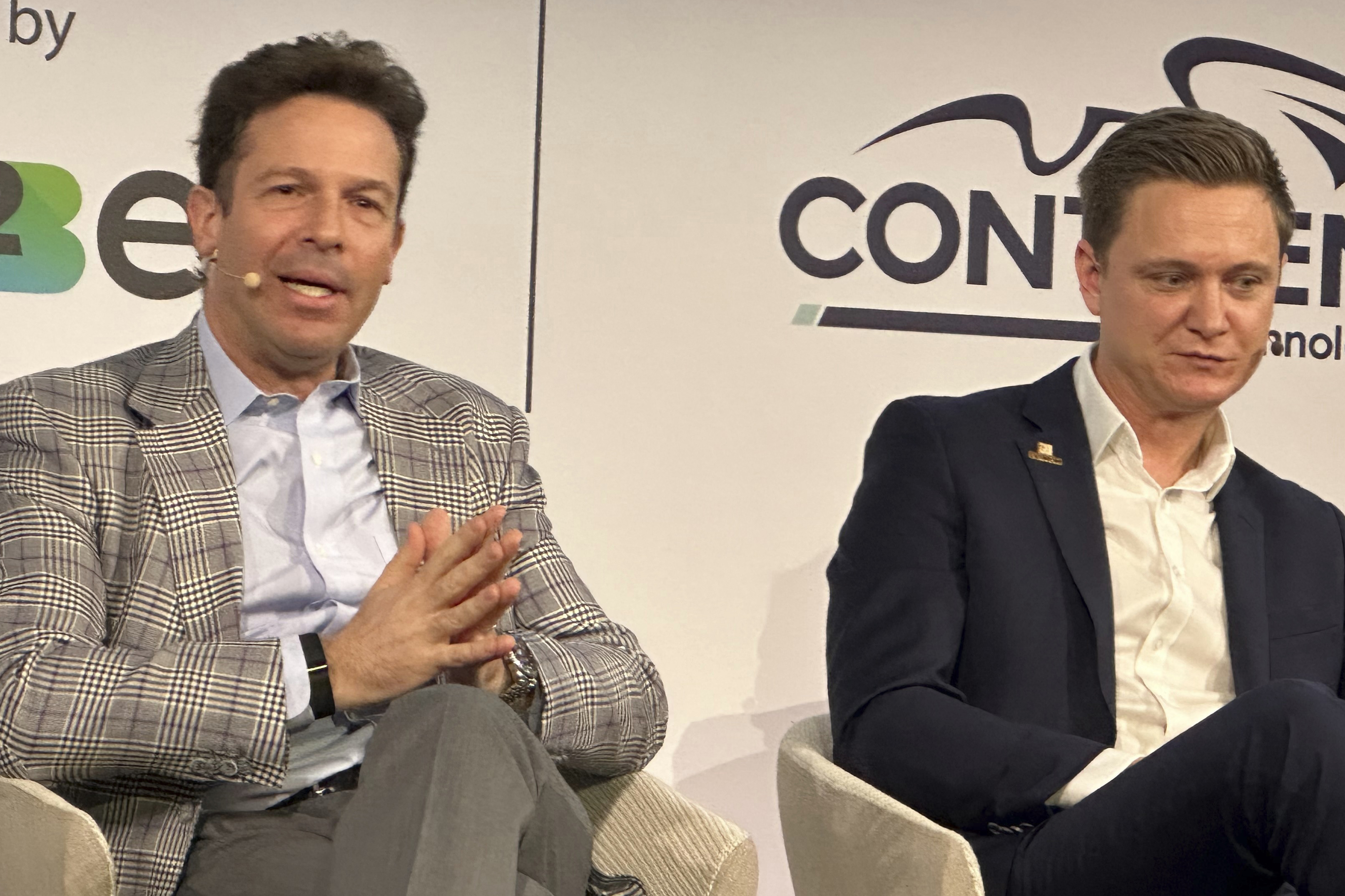 Seth Schorr, left, CEO of Fifth Street Gaming, speaks at a forum in New York on Thursday, March 7, 2024 about the future of online gambling in the U.S. as Oliver Bartlett, right, listens. Panelists at the next.io forum agreed that the next generation of online gambling products will be more social, more engaged with players and more targeted to their individual interests.