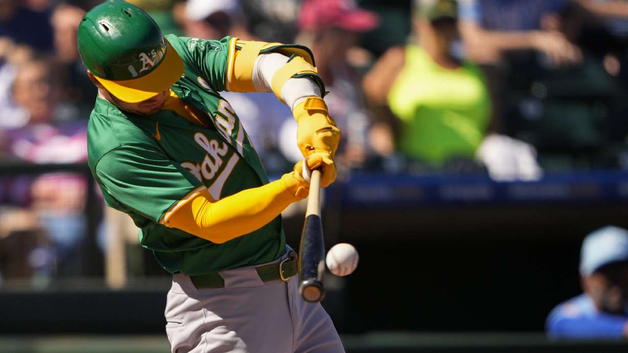 Oakland Athletics' Brent Rooker hits a single against the Kansas City Royals during a spring training baseball game on, March 1. The A's announced Thursday that they will play in Sacramento during the 2025 through 2027 seasons before moving to Las Vegas in 2028.