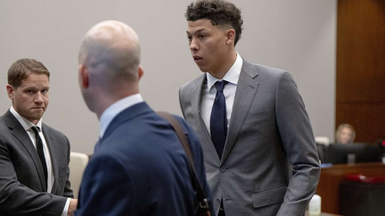 FILE - Jackson Mahomes, right, leaves the courtroom following a bond motion hearing in Johnson County District Court, May 16, 2023, in Olathe, Kan. The younger brother of Super Bowl-winning Kansas City Chiefs quarterback Patrick Mahomes has been sentenced to six months' probation in a case alleging an assault on a woman. Jackson Mahomes, 23, appeared Thursday, March 7, 2024, for his sentencing hearing via video conference and pleaded guilty to a single misdemeanor count of battery, according to online court records.
