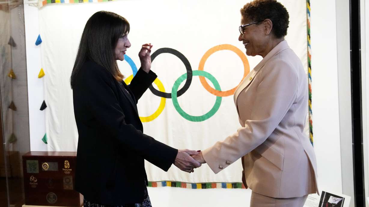Paris Mayor Anne Hidalgo, left, speaks with Los Angeles Mayor Karen Bass during a meeting at the Paris City Hall Thursday, March 7, 2024. Bass is leading a trip to Paris to prepare for 2028 Olympic Games in Los Angeles.