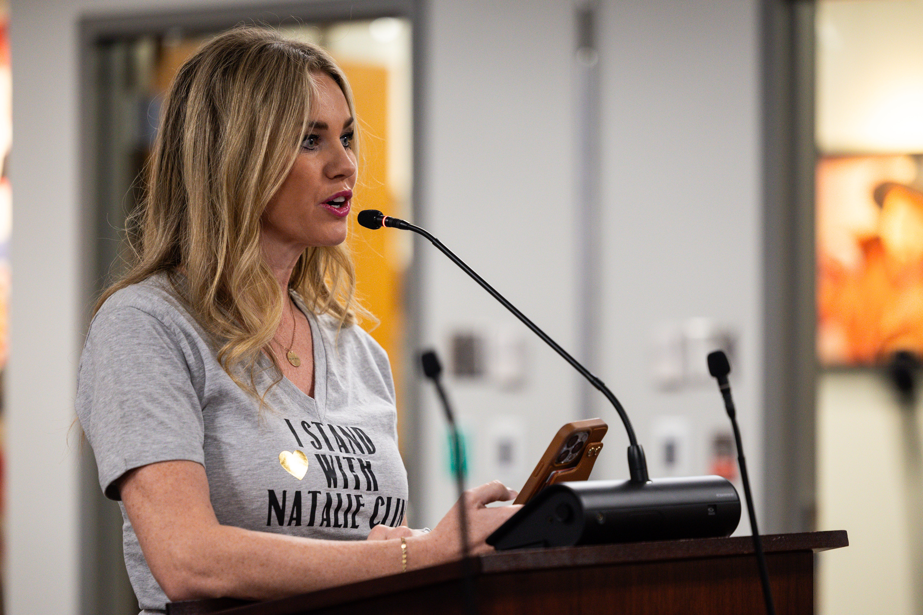 Tiffany Barker speaks during public comment in support of Natalie Cline at the monthly meeting for the Utah State Board of Education, the first since the board voted to censure and strip Cline of her committee assignments, at the Utah State Board of Education in Salt Lake City on Thursday.