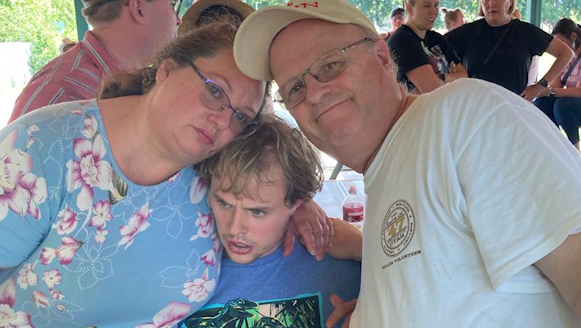 Kara Walker-Lyon and Blair Lyon are pictured right after reuniting with their son Jarrett Lyon, middle, last July. They are speaking out after a former caregiver was recently sentenced to community service for losing their nonverbal son last summer.