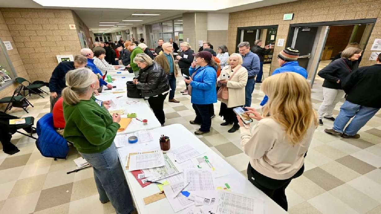 Voters attend Republican Caucus Night at Olympus High School in Holladay on Tuesday. Republican voters may have been dissuaded by an uncompetitive primary, confusing changes and long waits.