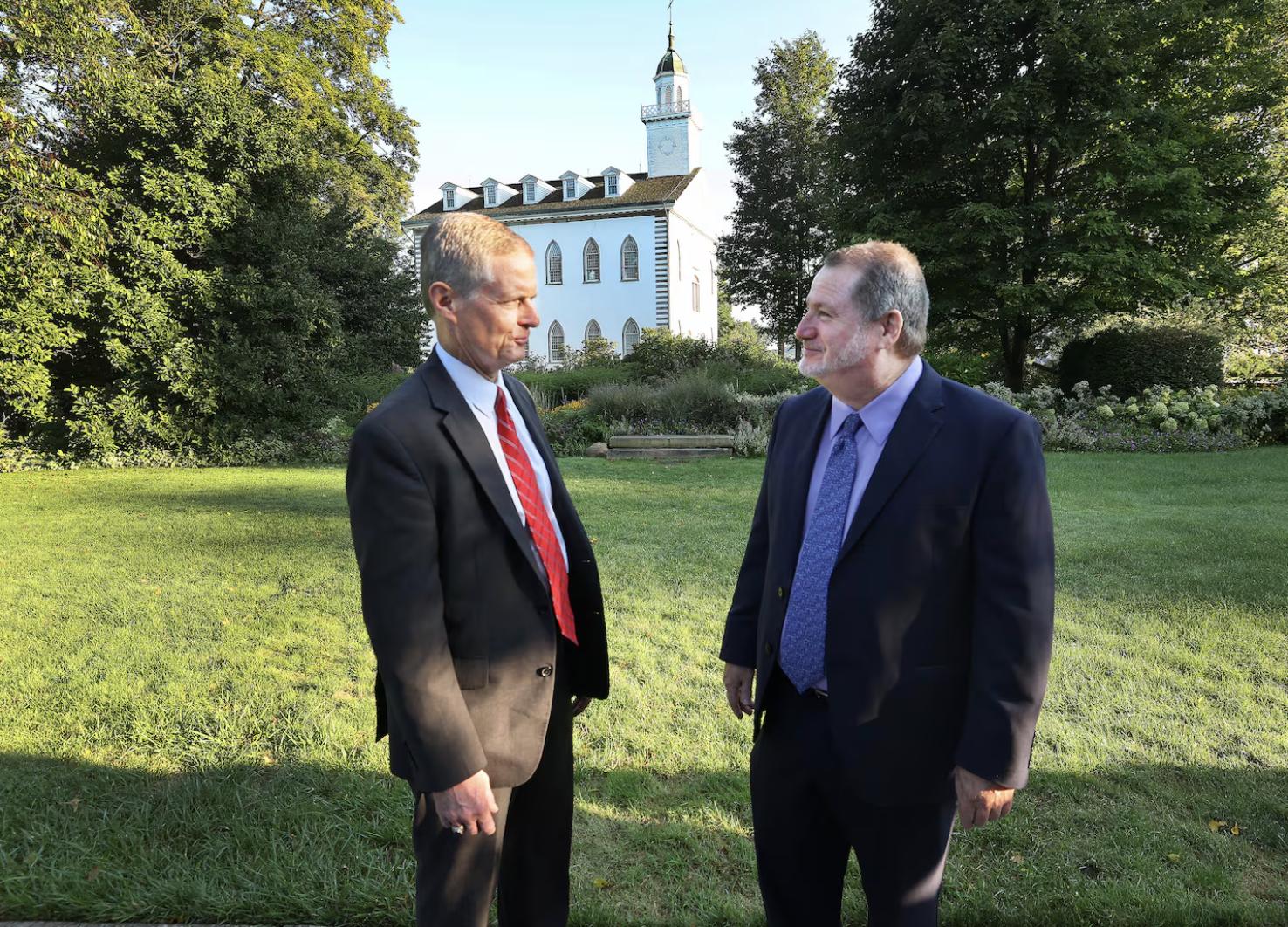 Elder David A. Bednar of Quorum of the Twelve Apostles of The Church of Jesus Christ of Latter-day Saints talks with Community of Christ Apostle Lachlan Mackay near the Kirtland Ohio Temple in Kirtland, Ohio, on Aug. 26, 2023.