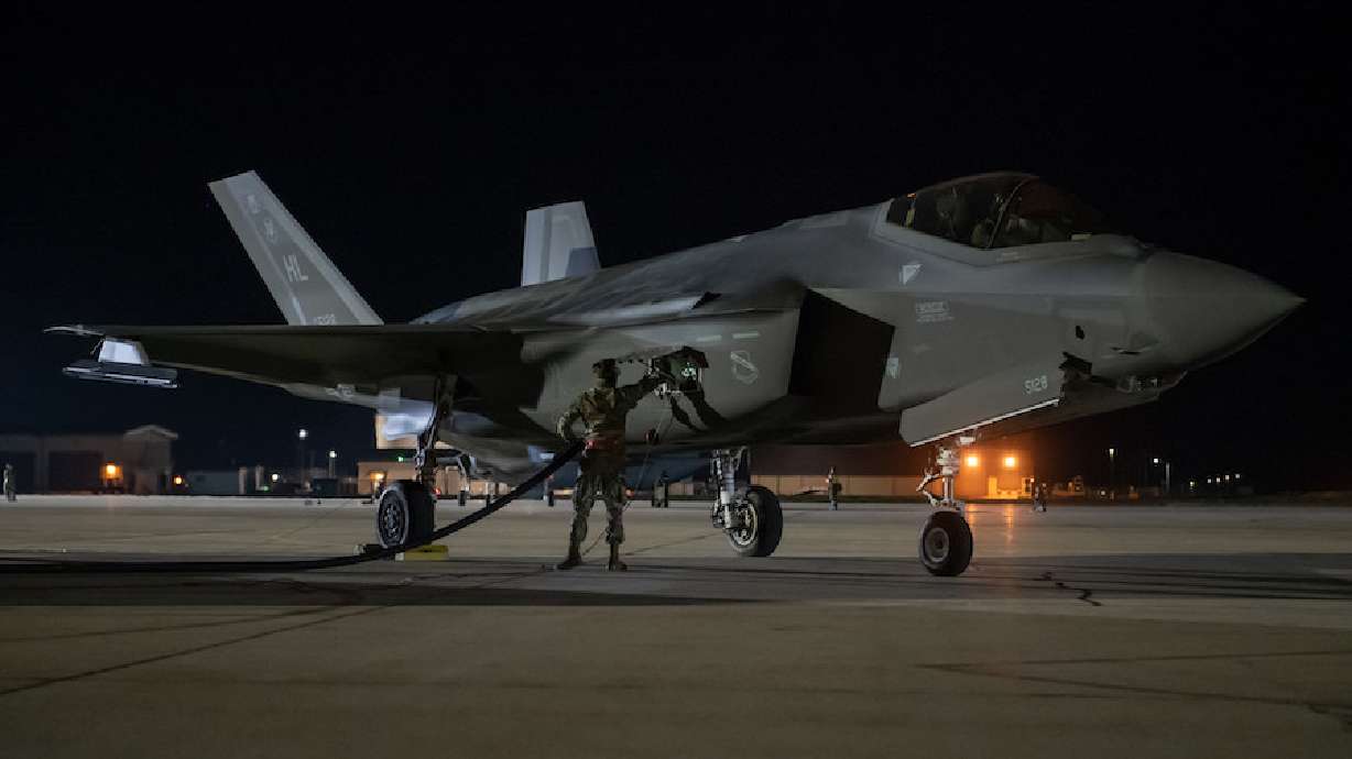 An Airman monitors an F-35A Lightning II during a hot pit refuel at Hill Air Force Base during night flying operations. Training flights are scheduled to begin Monday.