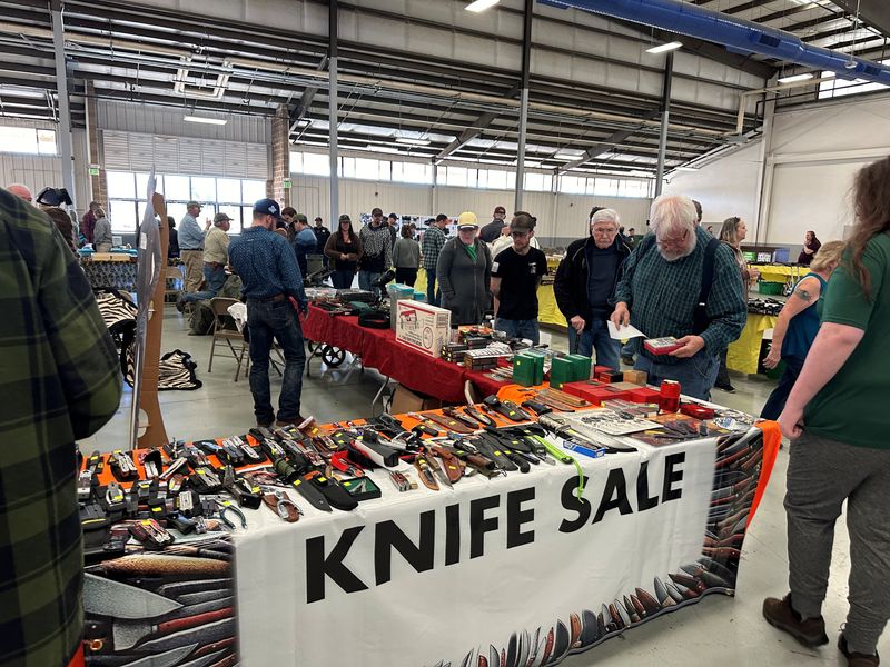Knives are displayed for sale at the "Survival & Prepper Show" in Longmont, Colo., March 2.