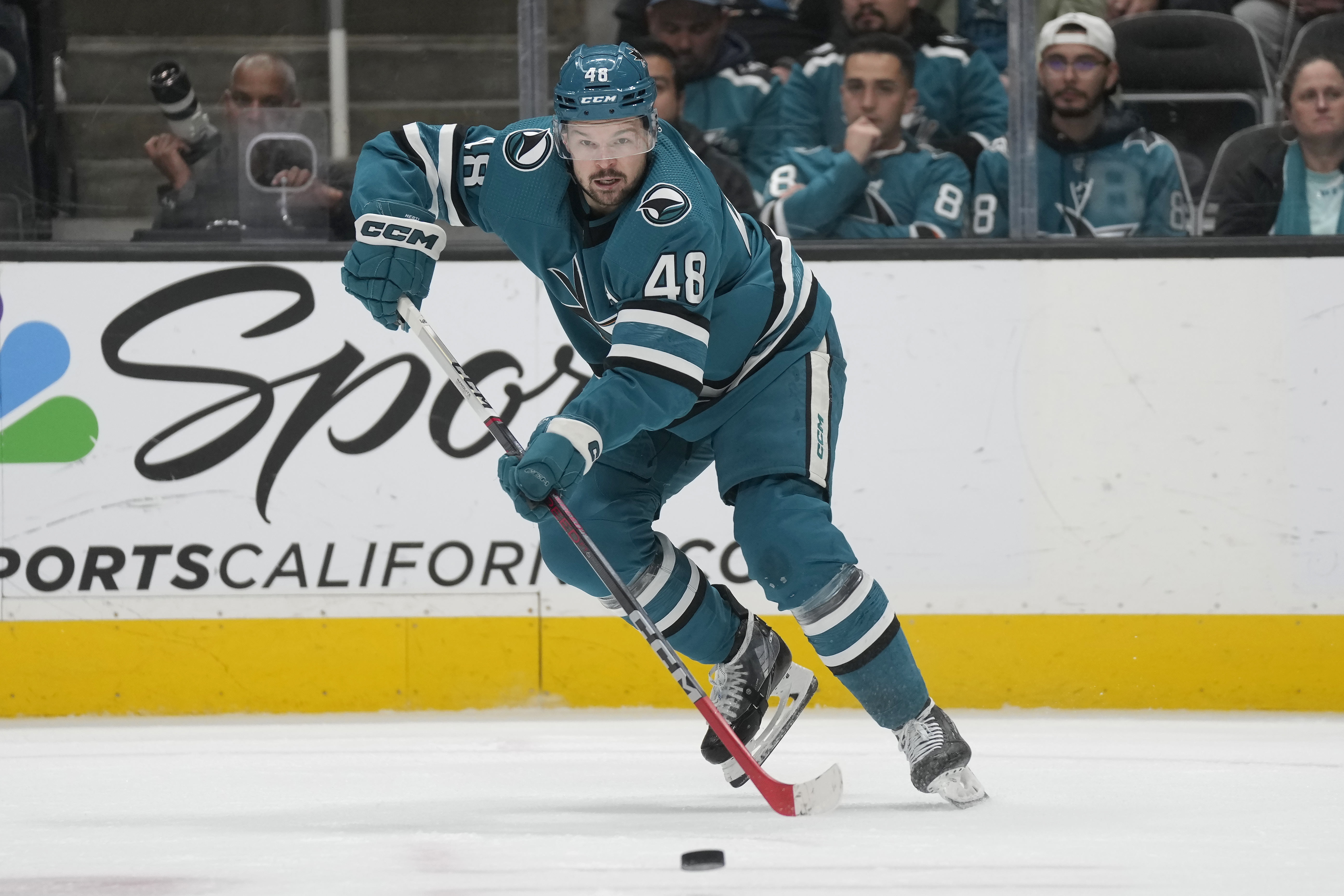 FILE San Jose Sharks center Tomas Hertl skates with the puck against the Los Angeles Kings during the second period of an NHL hockey game in San Jose, Calif., Tuesday, Dec. 19, 2023. The defending Stanley Cup champion Vegas Golden Knights acquired Hertl from San Jose in what so far stands as the biggest deal made on the final day of NHL trading, Friday, March 8, 2024.