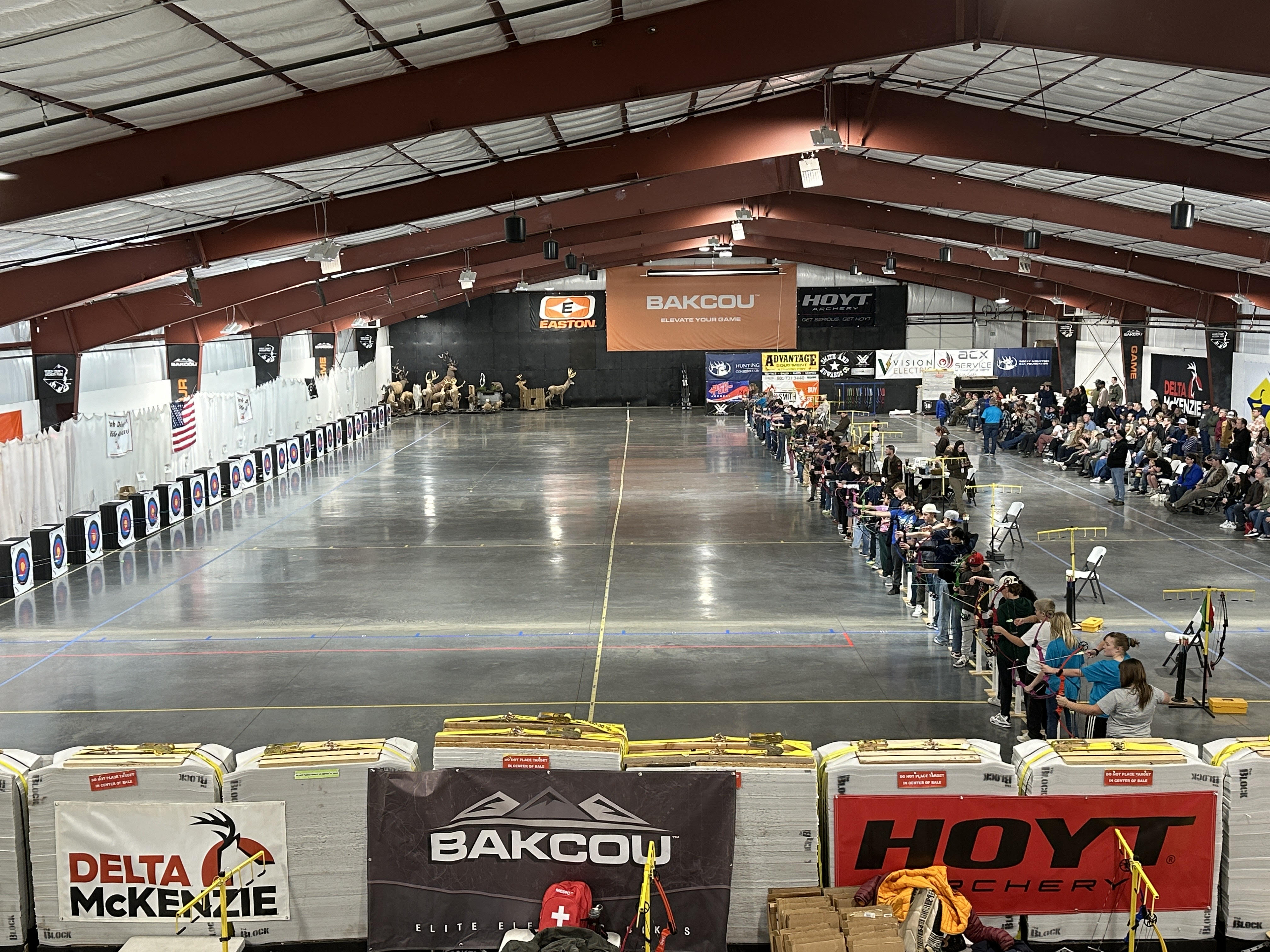 Students aim at their targets during the tournament Friday at the Weber County Archery Park in Ogden.
