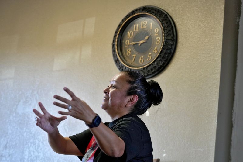 Melissa Blackhair talks about daylight savings time, March 4, from her home in Tuba City, Ariz. The Navajo Nation, which stretches into Utah and New Mexico, will reset clocks for one hour later despite the rest of Arizona remaining on standard time.