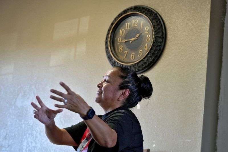 Melissa Blackhair talks about daylight savings time, March 4, from her home in Tuba City, Ariz. The Navajo Nation, which stretches into Utah and New Mexico, will reset clocks for one hour later despite the rest of Arizona remaining on standard time.