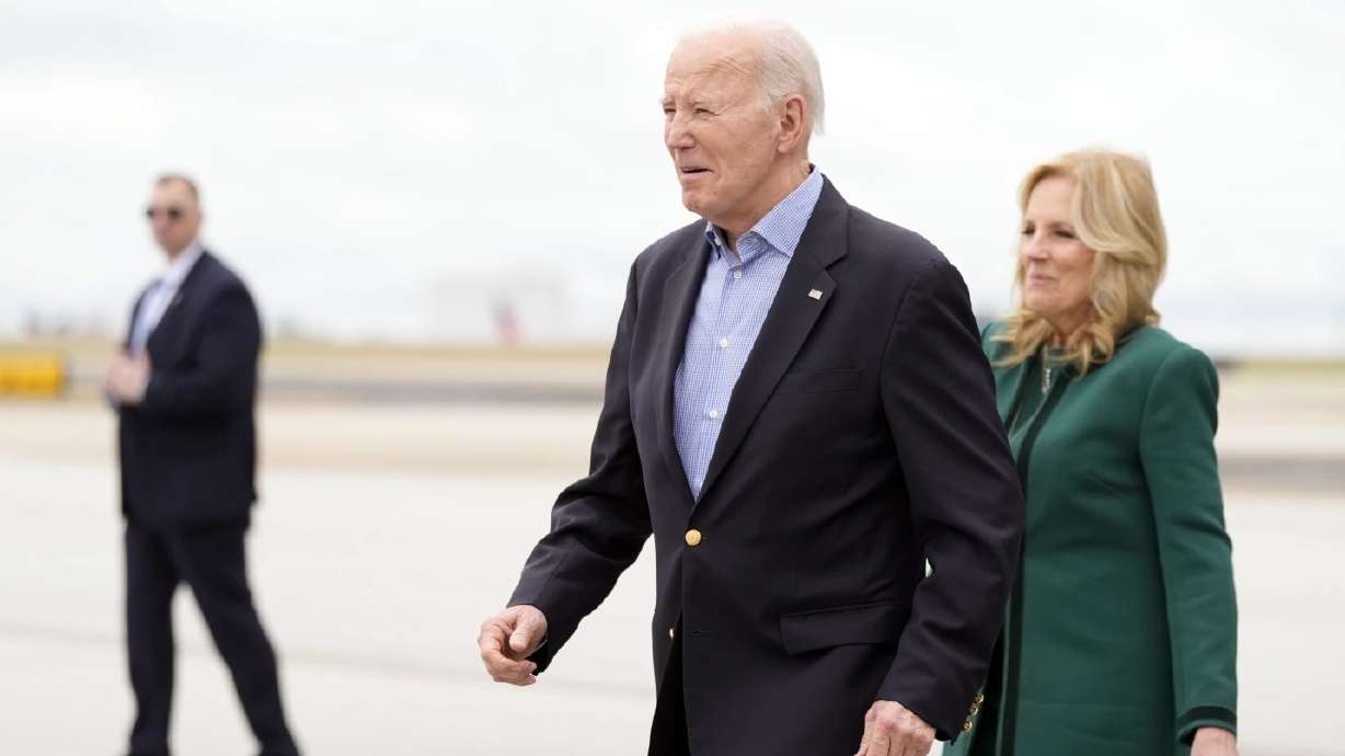 President Joe Biden and first lady Jill Biden arrive at Hartsfield-Jackson Atlanta International Airport, in Atlanta, Saturday. Biden said Saturday he regrets using the term "illegal" during his State of the Union address.