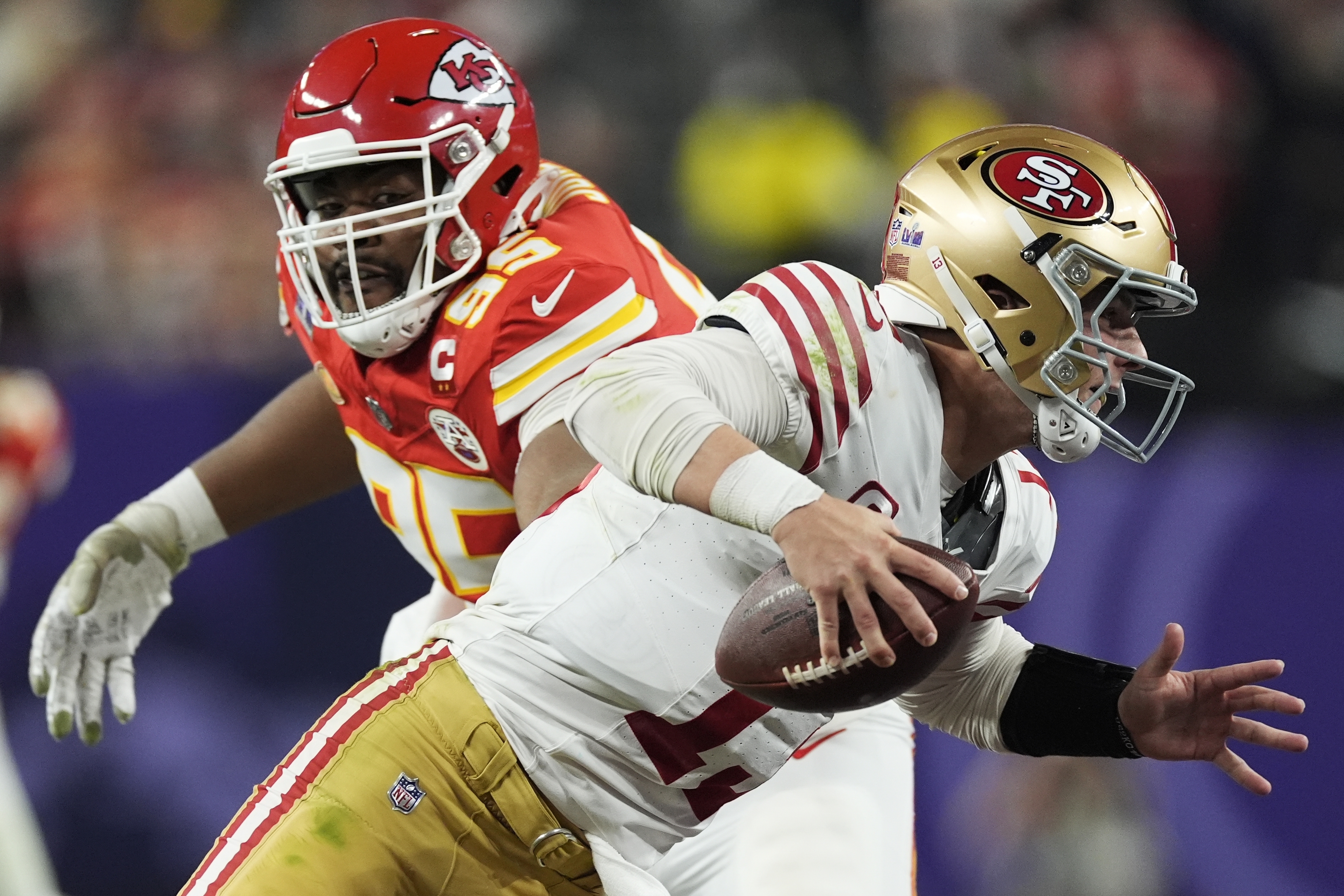 Kansas City Chiefs defensive tackle Chris Jones (95) chases San Francisco 49ers quarterback Brock Purdy (13) during the second half of the NFL Super Bowl 58 football game Sunday, Feb. 11, 2024, in Las Vegas. 