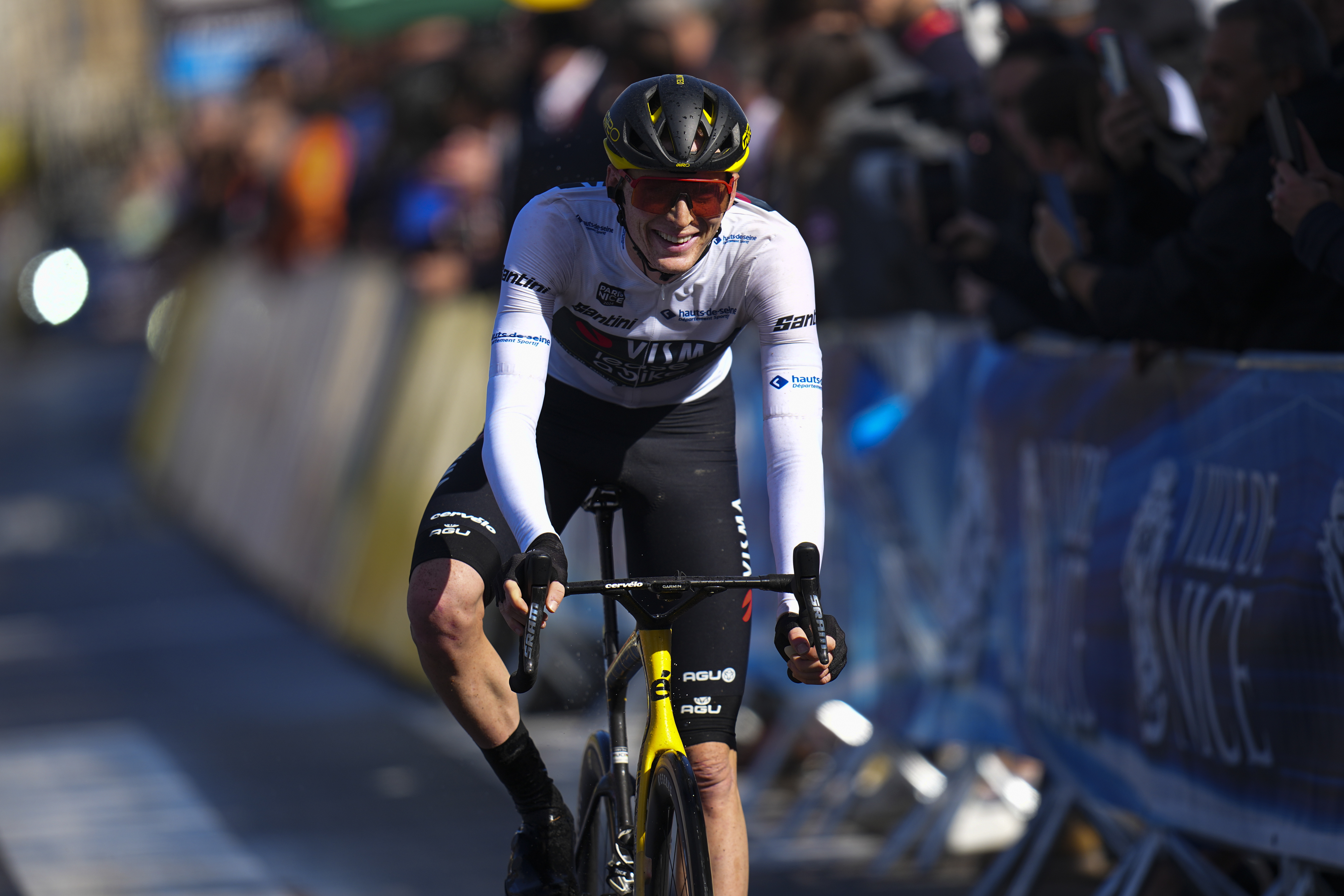 Matteo Jorgensen of the U.S. crosses the finish line to win the general clasification during the eighth and final stage of the Paris-Nice cycling race in Nice, Sunday, March 10, 2024. 
