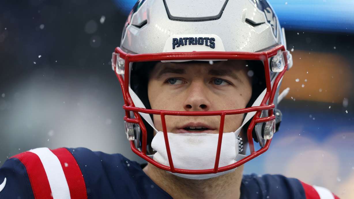 FILE - New England Patriots quarterback Mac Jones prior to an NFL football game against the New York Jets, Jan. 7, 2024, in Foxborough, Mass. A person familiar with negotiations says the Jacksonville Jaguars have agreed to acquire Mac Jones in exchange for a late-round pick in next month's NFL draft. The person spoke to The Associated Press on condition of anonymity Sunday, March 10, 2024 because the trade cannot become official until the new league year begins Wednesday and after Jones passes a physical.