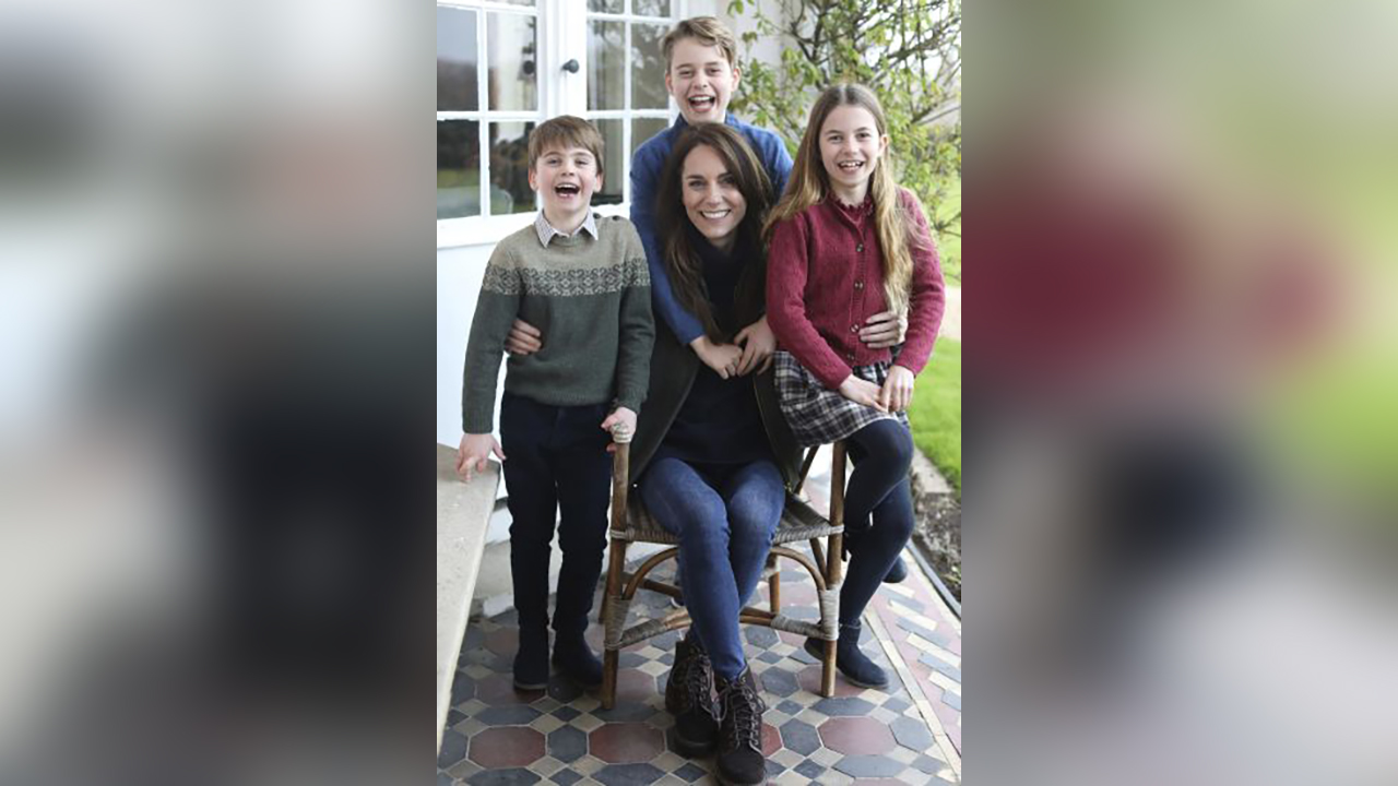 This undated photo shows Kate, Princess of Wales with her children, Louis, George and Charlotte, taken in Windsor. The Princess of Wales has apologized for "confusion" caused by editing of the family photo.