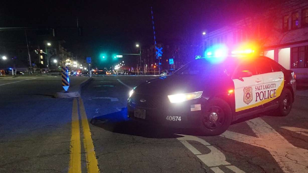 A woman was hospitalized with life-threatening injuries after she was hit by a car early Monday at 600 W. North Temple in Salt Lake City.