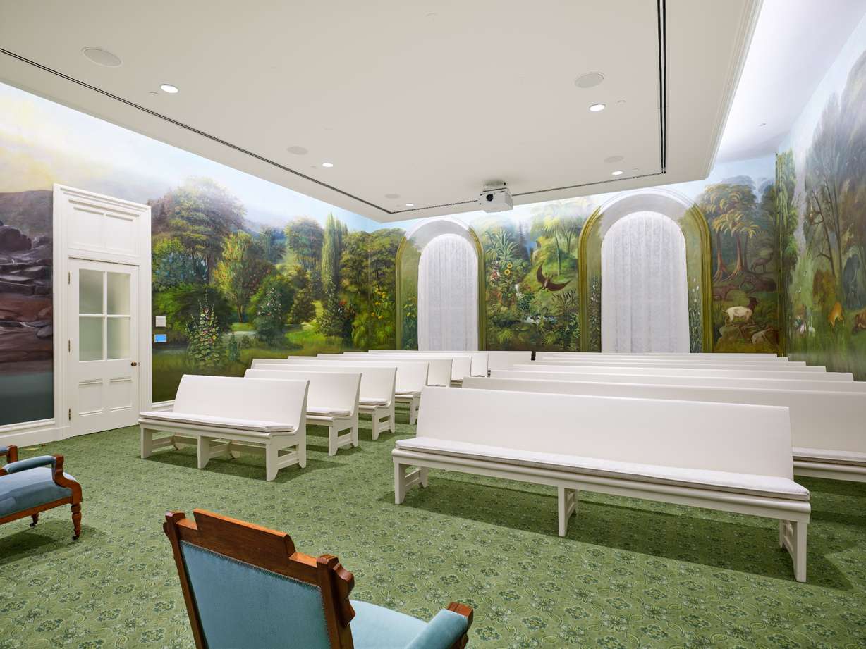 An ordinance room inside the Manti Utah Temple, with dinosaurs in the mural. The temple is opening for public tours this week after being closed for over two years for renovations.