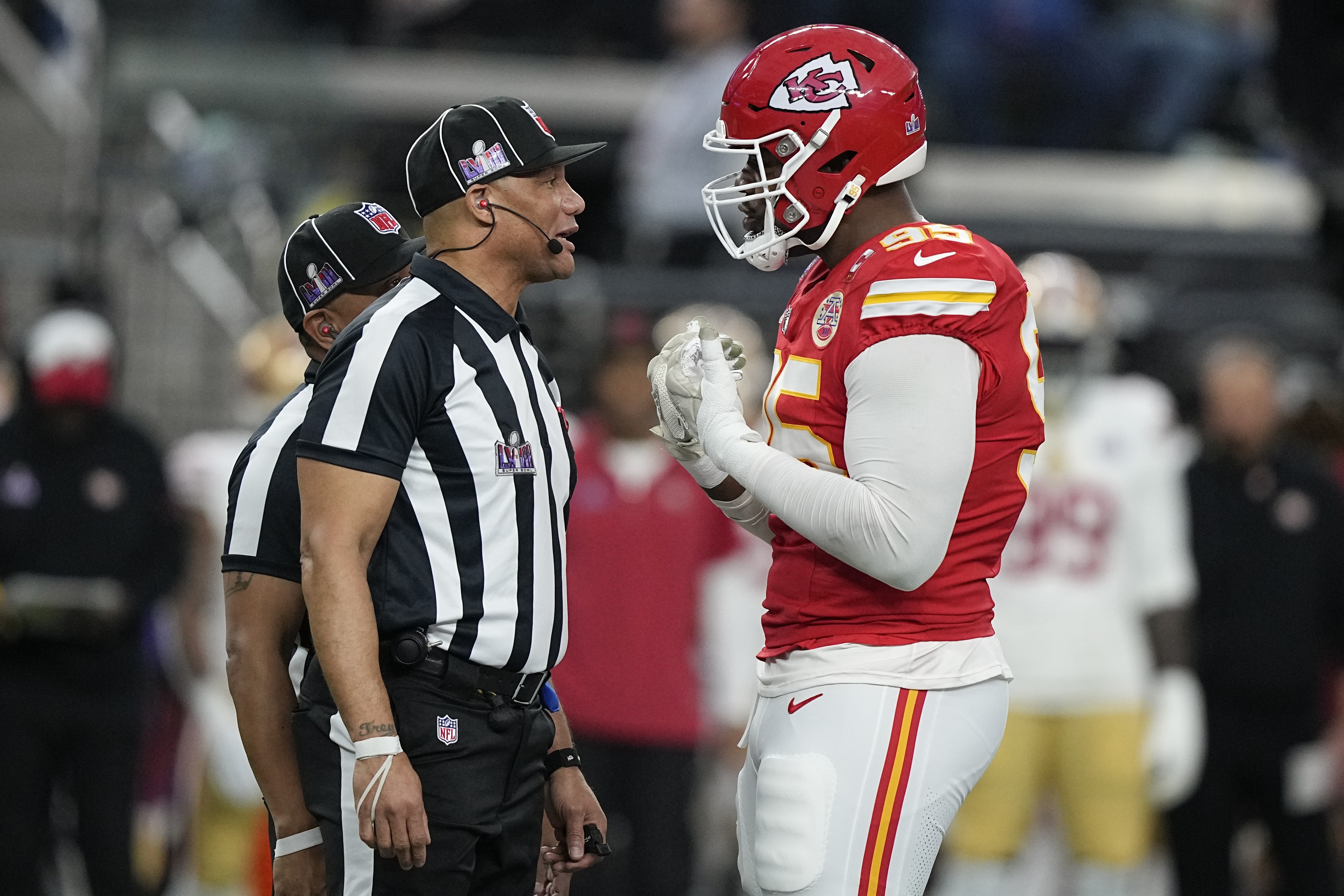 Kansas City Chiefs defensive tackle Chris Jones, right, talks with officials during the first half of the NFL Super Bowl 58 football game against the San Francisco 49ers on Sunday, Feb. 11, 2024, in Las Vegas.