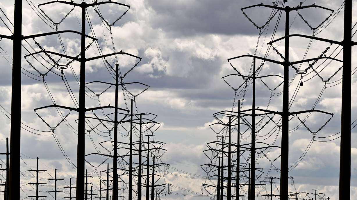 Power lines are pictured in Salt Lake City near the International Airport on Monday. An analysis of state-by-state data collected by the federal government tracked costs of electricity.