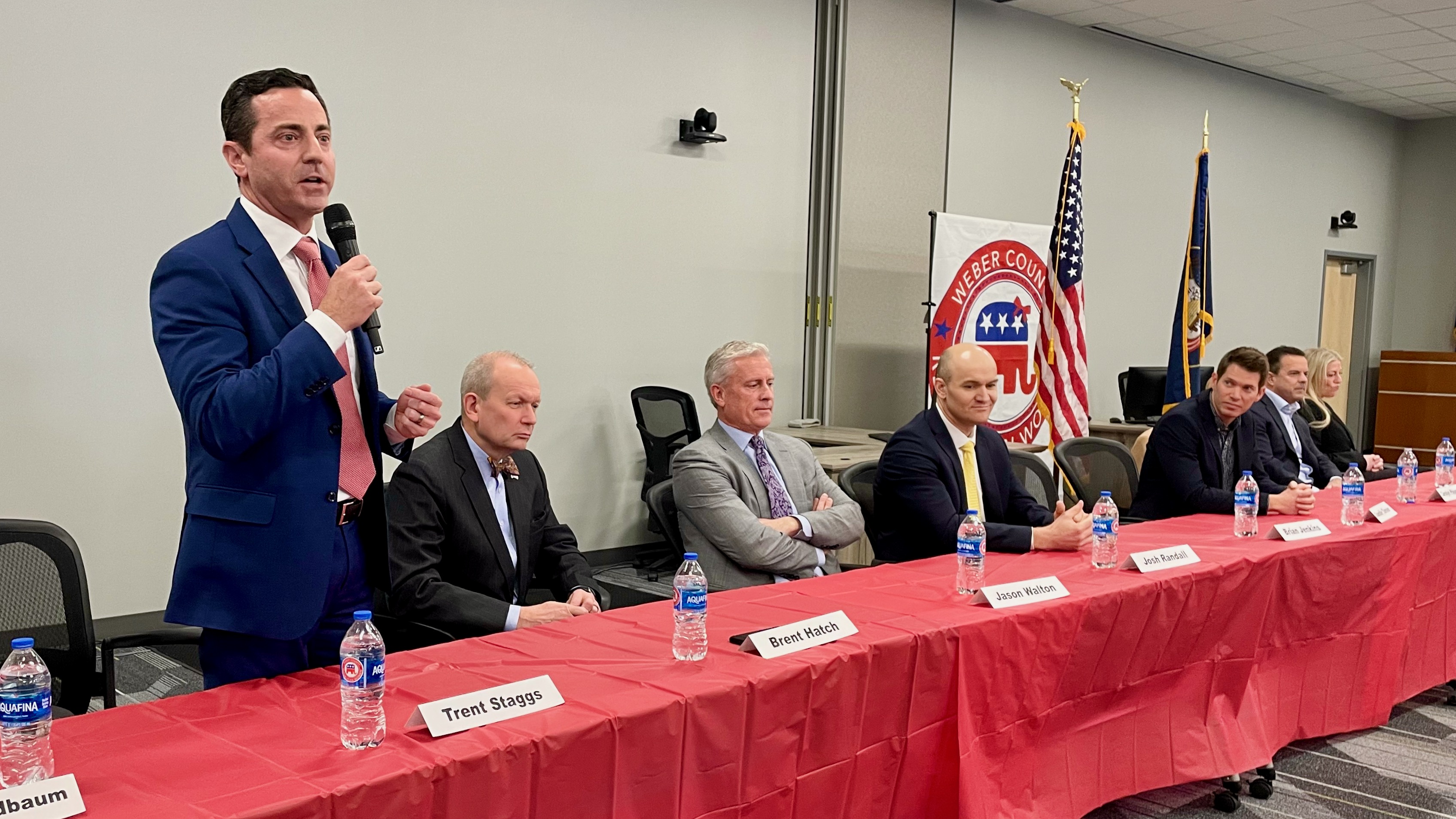 U.S. Senate hopeful Trent Staggs addresses a forum featuring the GOP Senate candidates on Monday in Ogden. To Staggs' left are Brent Orrin Hatch, Jason Walton, Josh Randall, Chandler Tanner, Carolyn Phippen (out of view), Brad Wilson and Adrielle Herring, campaign chairwoman for John Curtis.