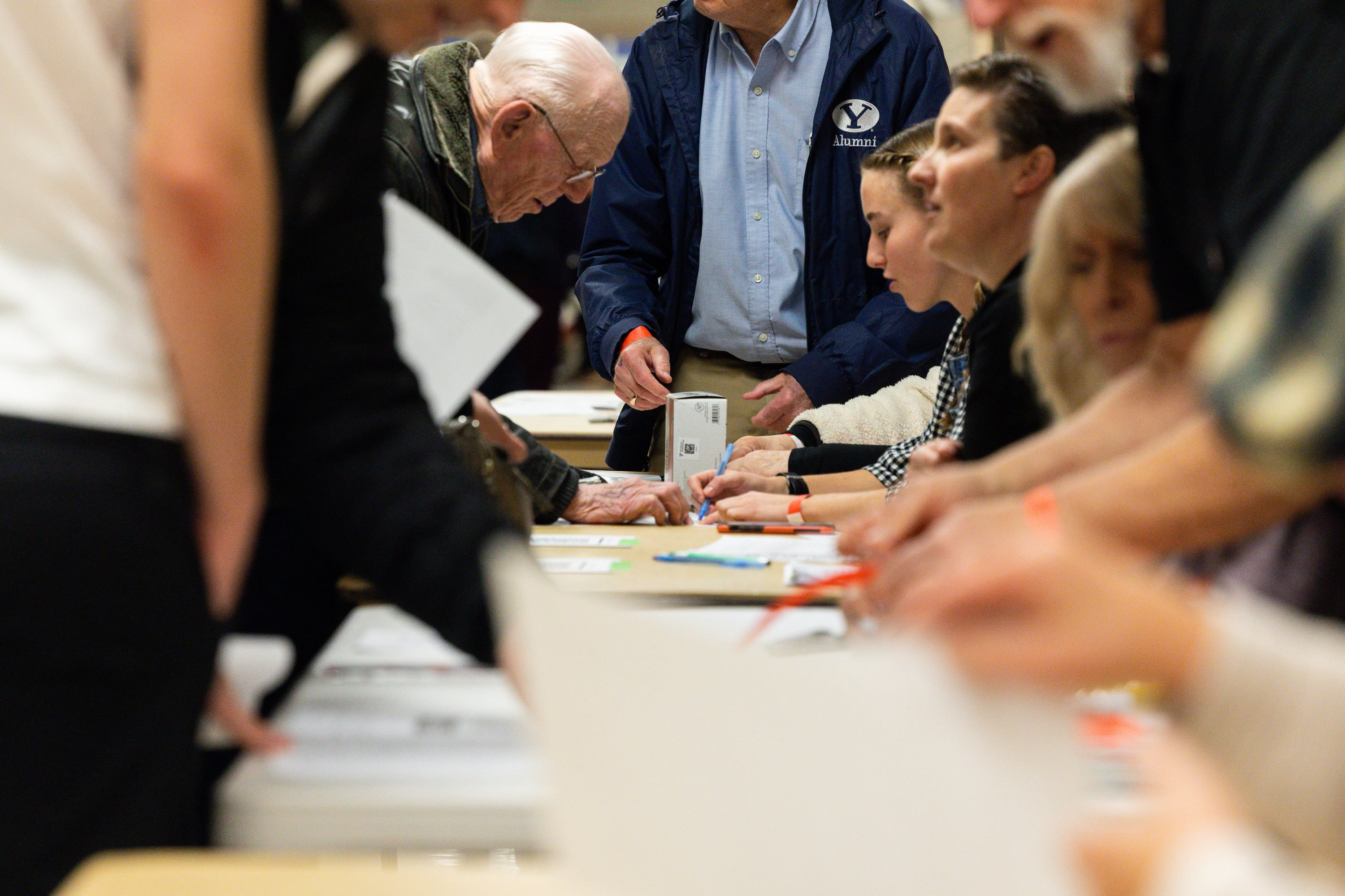 Attendees check in at a Republican caucus at Centennial Middle School in Provo on March 5. A Utah lawmaker said exceptionally low participation in the state Republican Party's presidential nomination process warrants a closer look by state legislators.
