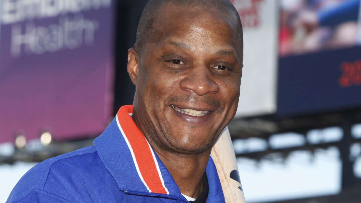 FILE - Former New York Mets baseball player Darryl Strawberry poses at Citi Field in New York Aug. 1, 2010. Former New York Mets and Yankees star Darryl Strawberry is recovering from a heart attack and is at SSM Health St. Joseph Hospital. Mets spokesman Jay Horwitz said Tuesday, March 12, 2024, that Strawberry was stricken Monday, a day before the eight-time All-Star's 62nd birthday.