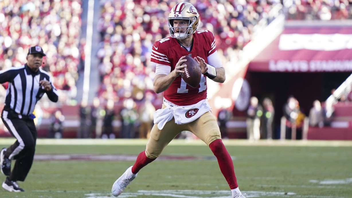 FILE - San Francisco 49ers quarterback Sam Darnold (14) looks to pass during an NFL football game against the Los Angeles Rams in Santa Clara, Calif., Sunday, Jan. 7, 2024. The Minnesota Vikings have agreed on a one-year, $10 million contract with quarterback Sam Darnold, a person with knowledge of the terms told The Associated Press on Tuesday, March 12, 2024.