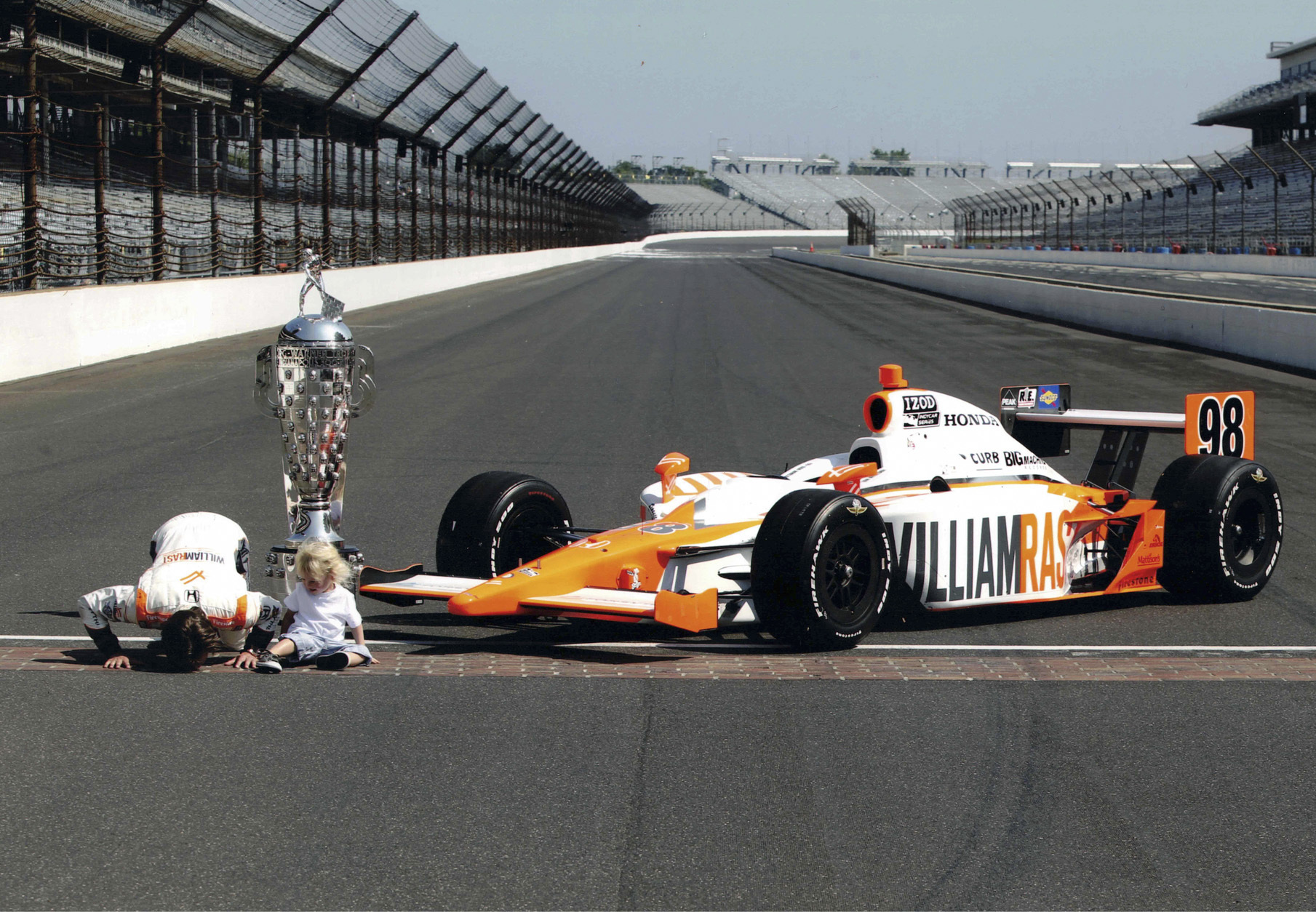 This image released by Max shows Dan Wheldon, left, with his son Sebastian in a scene from the HBO documentary "The Lionheart." 