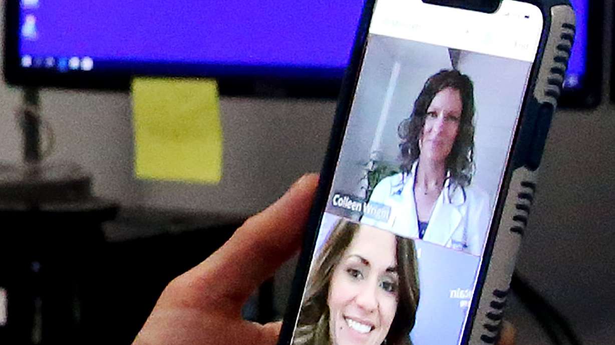 Debbie Farka demonstrates what a virtual visit with a doctor would be like at the Intermountain TeleHealth Center in Murray on March 10, 2020. Rep. Blake Moore pointed to Utah's Intermountain Health as an example of a successful telehealth program.
