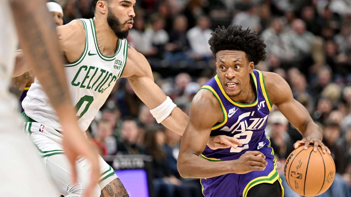 Boston Celtics forward Jayson Tatum (0) defends Utah Jazz guard Collin Sexton (2) as the Utah Jazz and Boston Celtics play at the Delta Center in Salt Lake City on Tuesday, March 12, 2024. Celtics won 123-107.