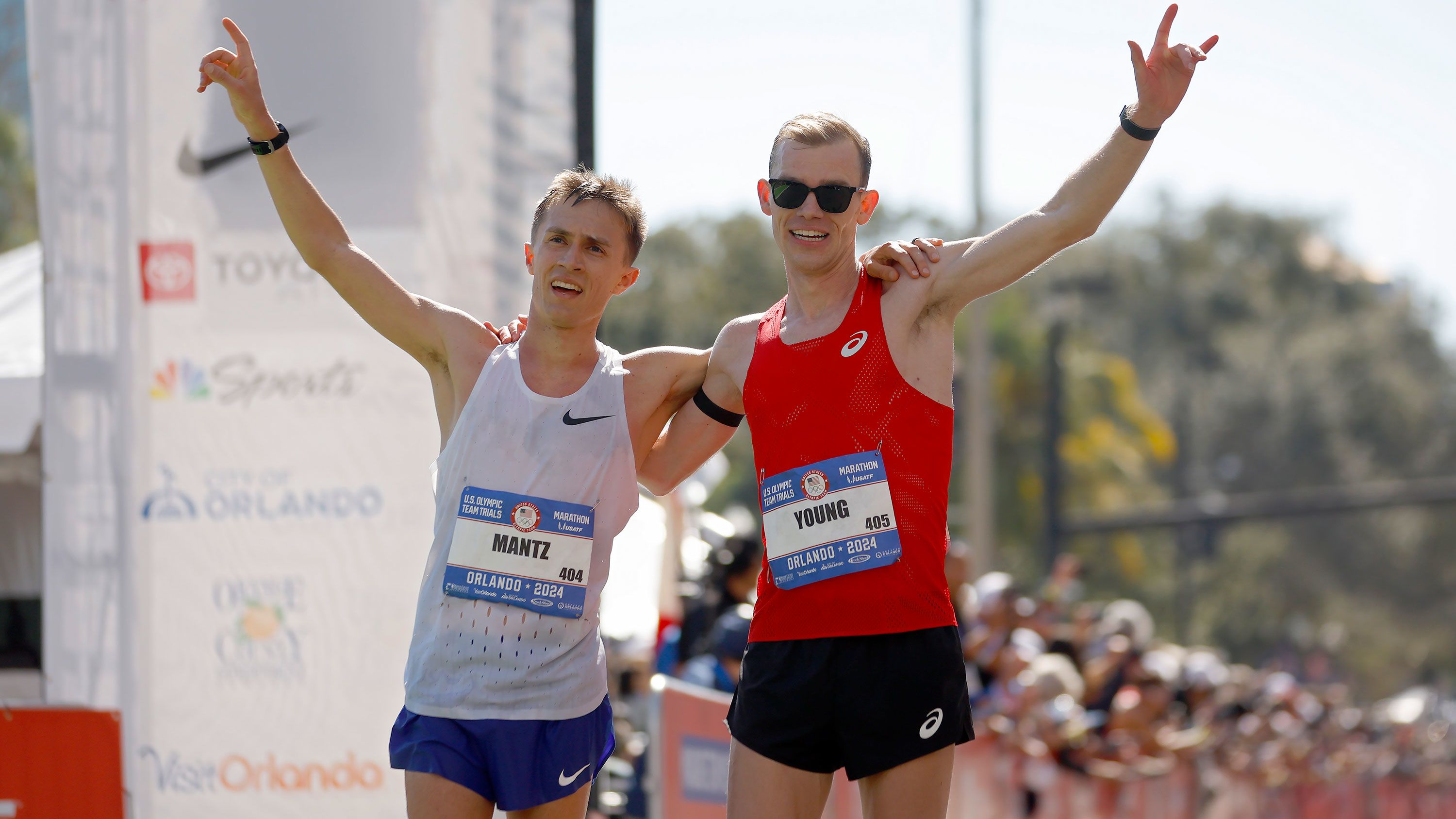Conner Mantz and Clayton Young celebrate after placing first and second during the US Olympic Trials on Feb. 3 in Orlando, Florida.