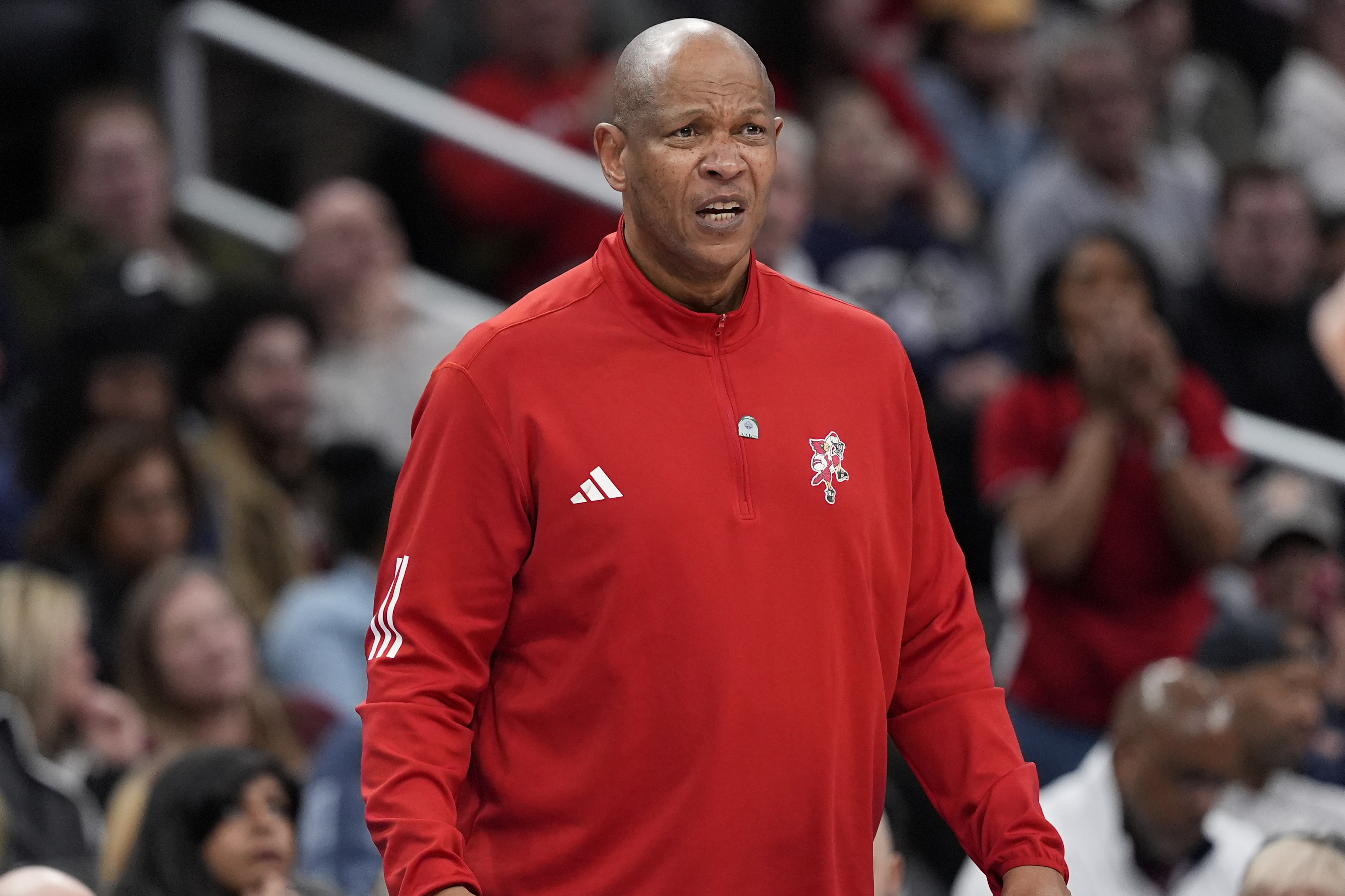 Louisville head coach Kenny Payne reacting in the closing minutes of the second half of the Atlantic Coast Conference NCAA college basketball tournament game against the North Carolina State, Tuesday, March 12, 2024, in Washington. 