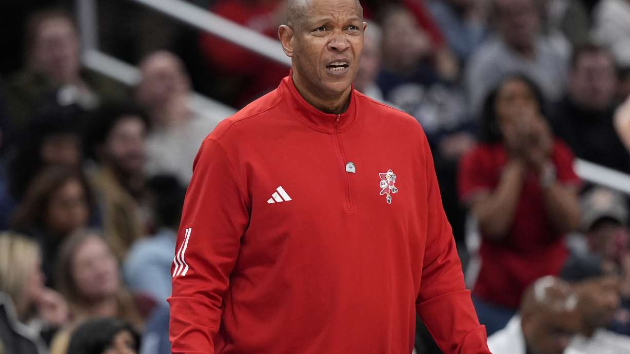 Louisville head coach Kenny Payne reacting in the closing minutes of the second half of the Atlantic Coast Conference NCAA college basketball tournament game against the North Carolina State, Tuesday, March 12, 2024, in Washington.