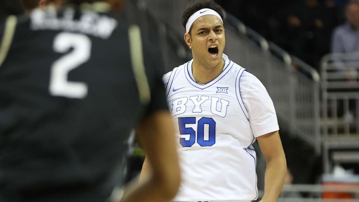 Brigham Young center Aly Khalifa (50) celebrates a three-pointer during the Big 12 conference tournament against UCF in Kansas City on Wednesday, March 13, 2024. BYU won 87-73.