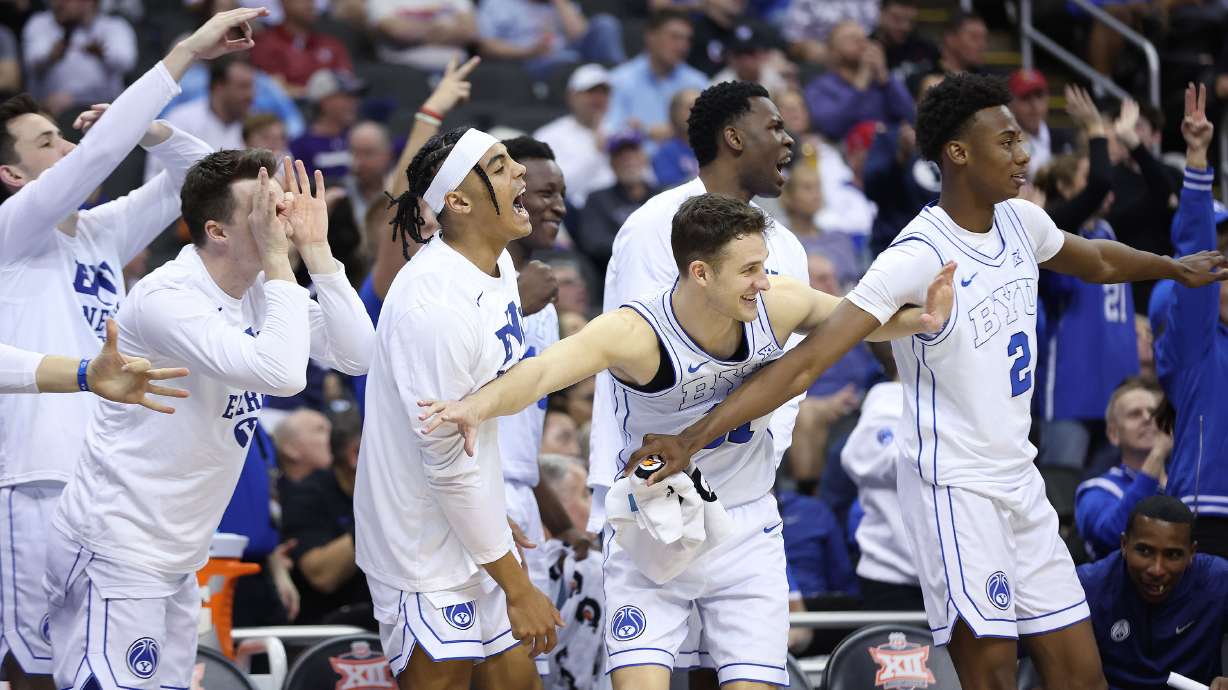 Brigham Young's bench celebrates a score during the Big 12 conference tournament against UCF in Kansas City on Wednesday, March 13, 2024. BYU won 87-73.