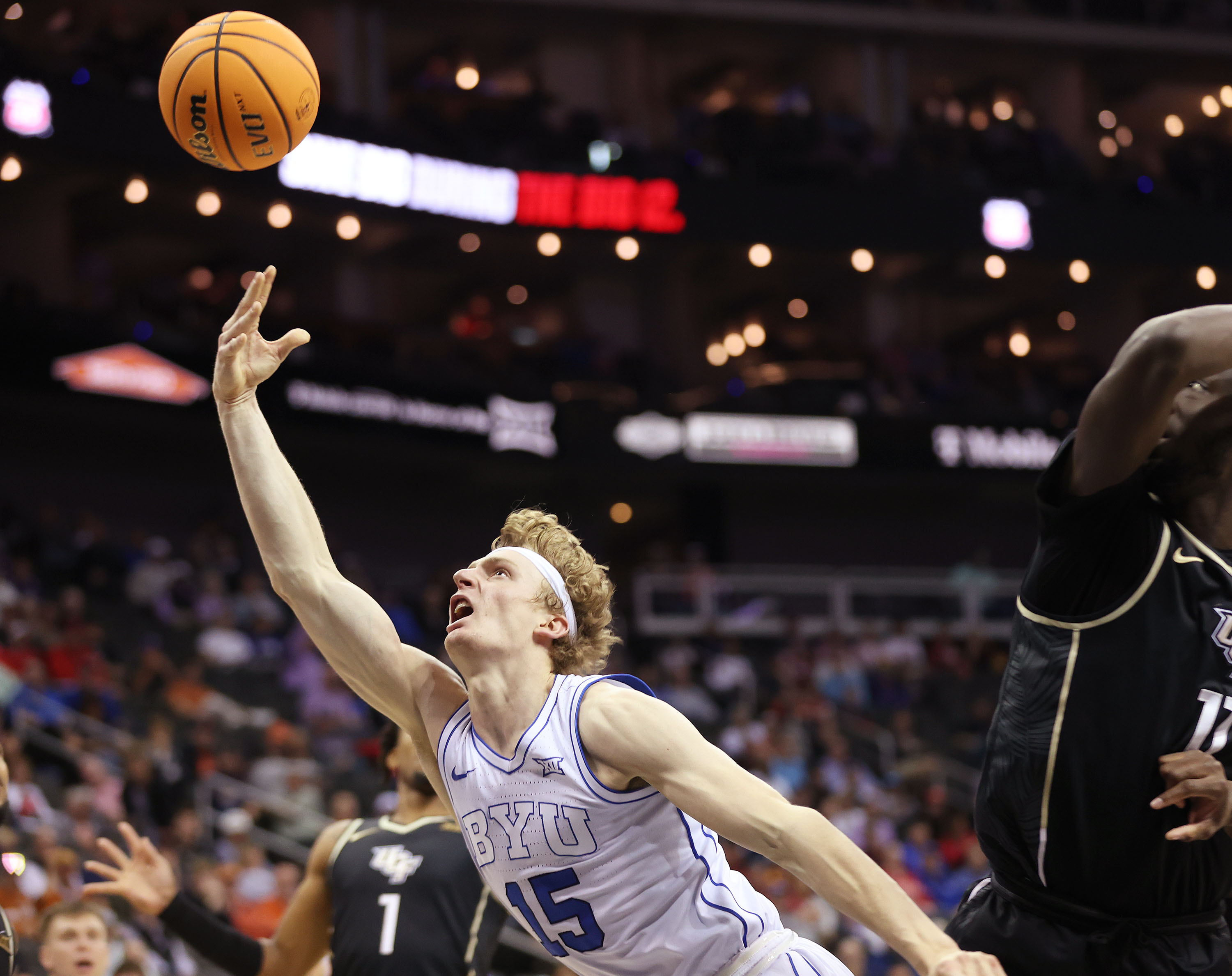 Brigham Young guard Richie Saunders (15) drives during the Big 12 conference tournament against UCF in Kansas City on Wednesday, March 13, 2024. BYU won 87-73.