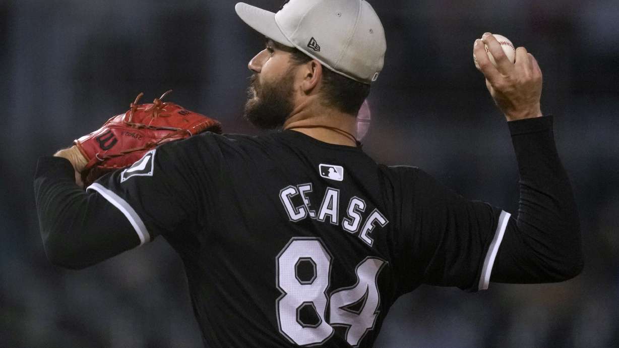 Chicago White Sox starting pitcher Dylan Cease throws to a Cincinnati Reds batter during the second inning of a spring training baseball game Tuesday, March 12, 2024, in Goodyear, Ariz.